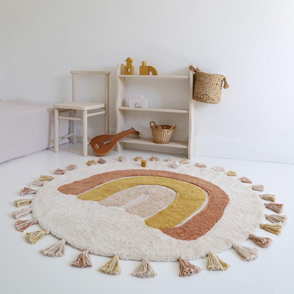 Wasbaar katoenen kindervloerkleed in regenboogkleuren met RAINBOW TOFFEE pompons
